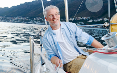 Man tacking on a sailboat